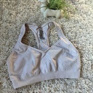 Fruit of the Loom size 34 B simple, and casual sports bra. Color white.